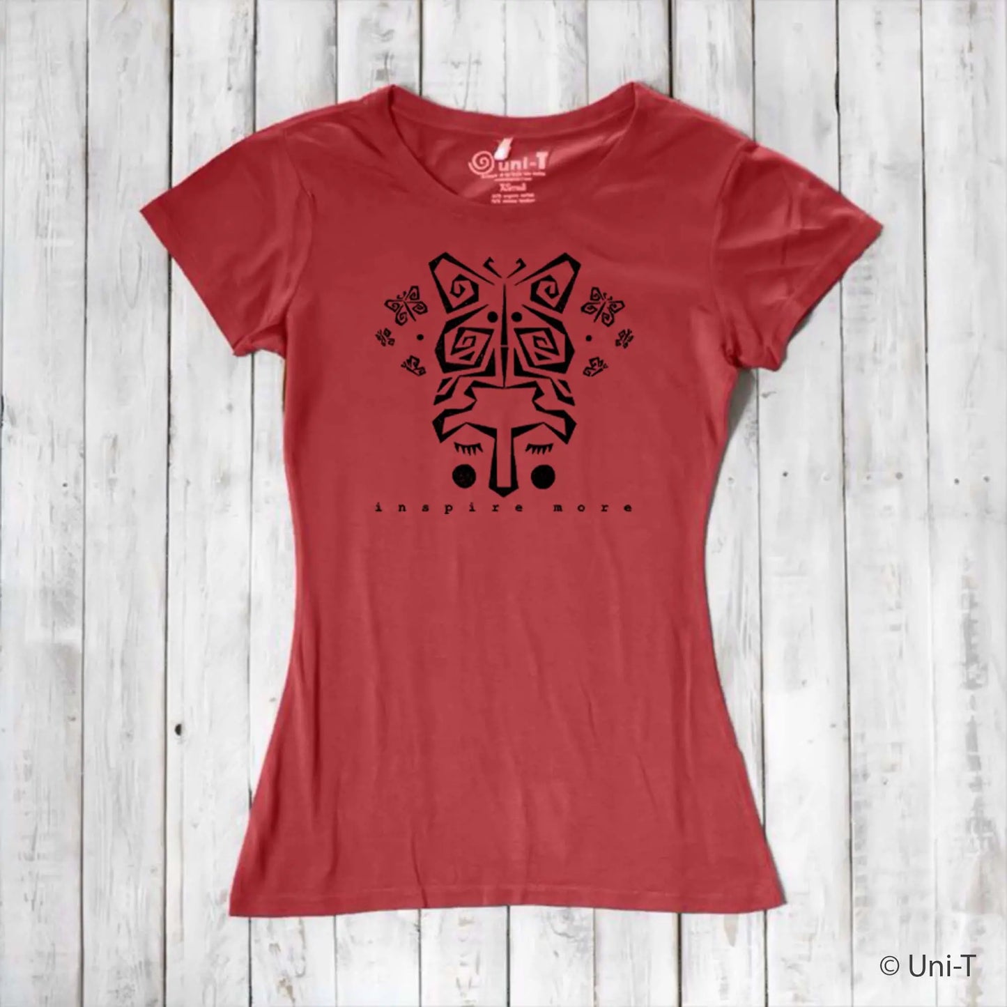 Red women's bamboo and organic cotton t-shirt with bold black butterfly graphic and 'Inspire More' message. Artistic and sustainable nature-themed tee.