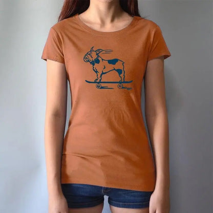 Model wearing orange French Bulldog T-Shirt made from bamboo & organic cotton, showcasing a playful dog on skateboard design for pet enthusiasts.