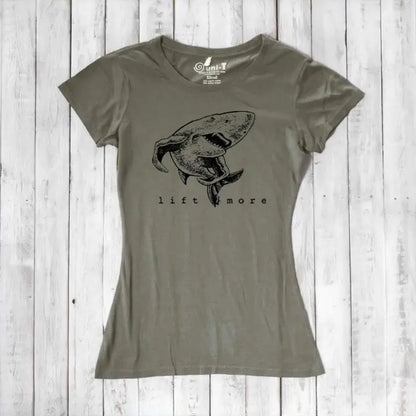 Olive green women's shark T-shirt in bamboo and organic cotton with 'Lift More' graphic. Eco-friendly gym tee for fitness motivation.
