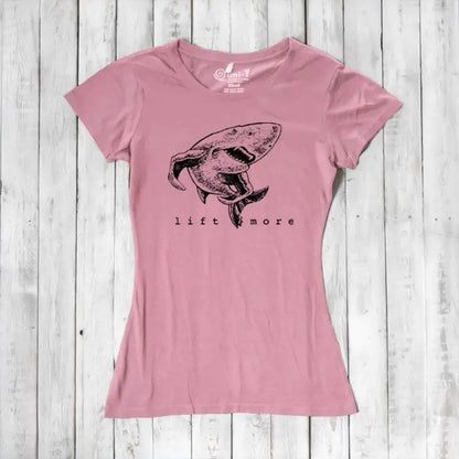 Pink women's workout T-shirt in bamboo and organic cotton with shark 'Lift More' design. Empowering gym wear for women lifters.