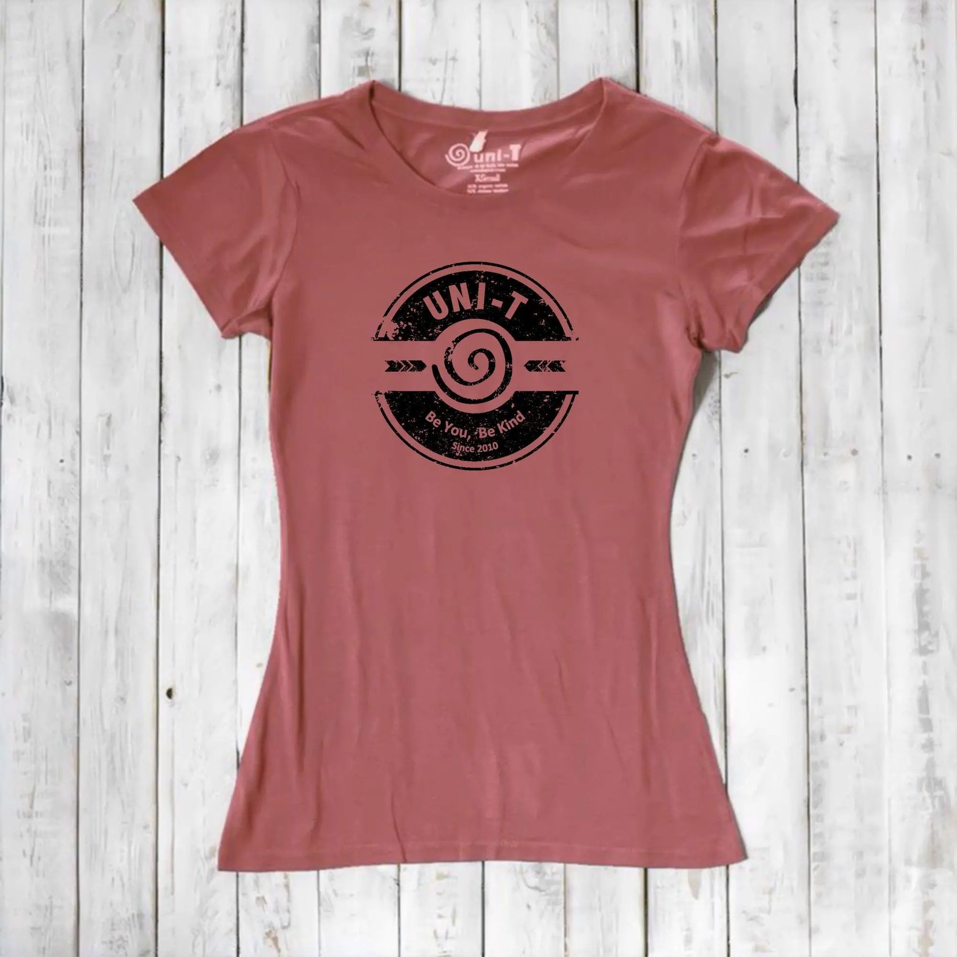Rust red women's bamboo & organic cotton tee with Uni-T's 'Be You Be Kind' graphic. A sustainable and stylish inspirational gift.