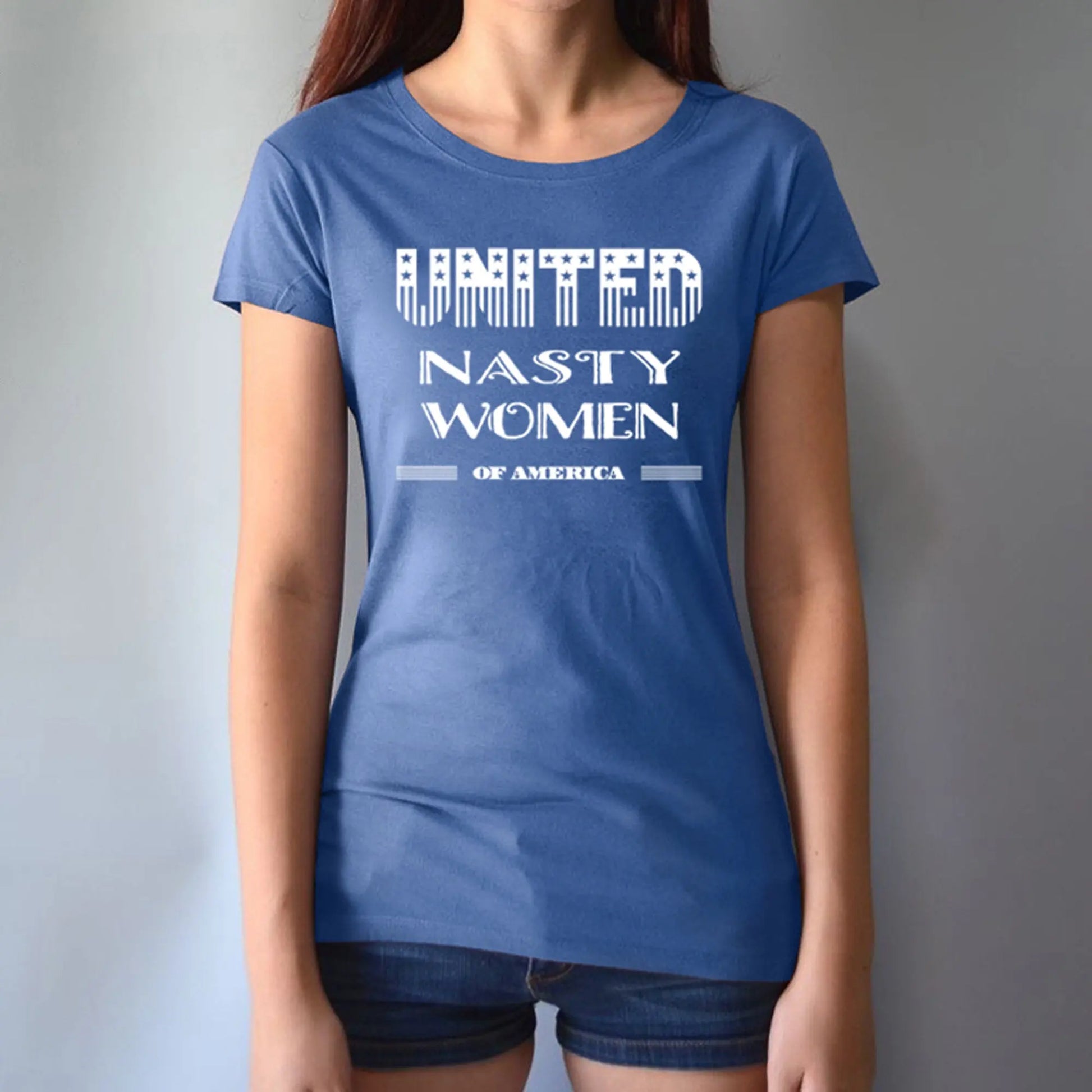 Model in blue bamboo & organic cotton women's T-shirt with 'United Nasty Women of America' slogan. Empowering activist fashion by Uni-T.