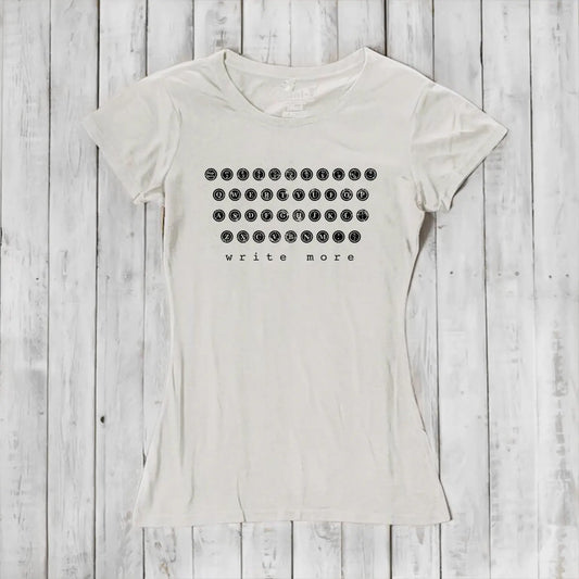 Women's Typewriter T-Shirt in bamboo and organic cotton in ivory with vintage 'Write More' typewriter key design. Ideal gift for writers.