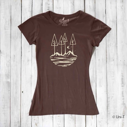 Brown eco-friendly women's graphic tee with minimalist forest and mountain design. Sustainable fashion for nature lovers and hikers.