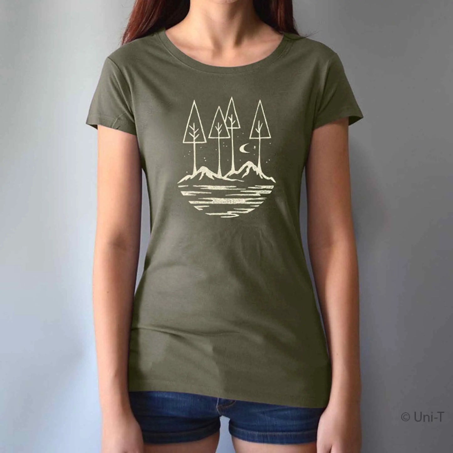 Olive green women's nature-themed t-shirt with mountain and tree print. Made from soft bamboo and organic cotton for eco-conscious wearers.