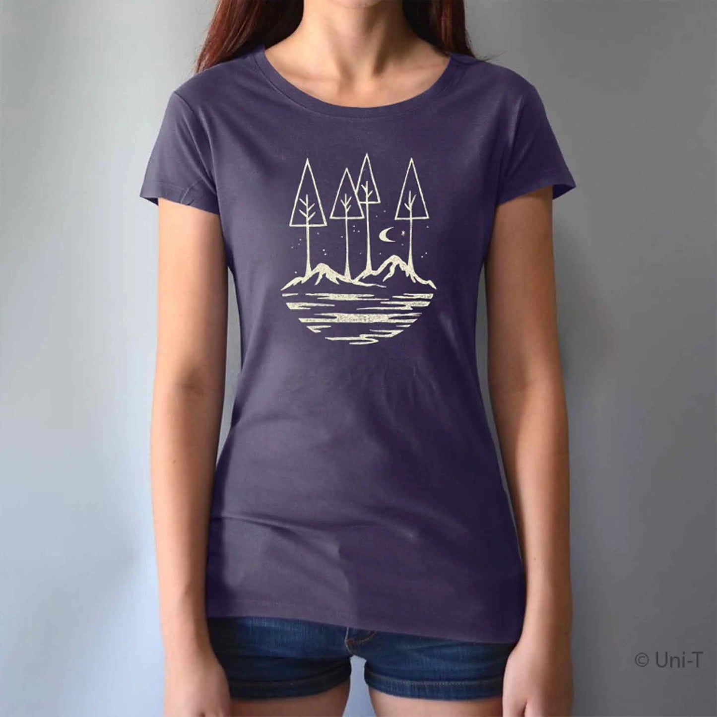 Purple women's bamboo and organic cotton tee with scenic mountain and tree design. Positive vibe graphic for eco-conscious adventurers.