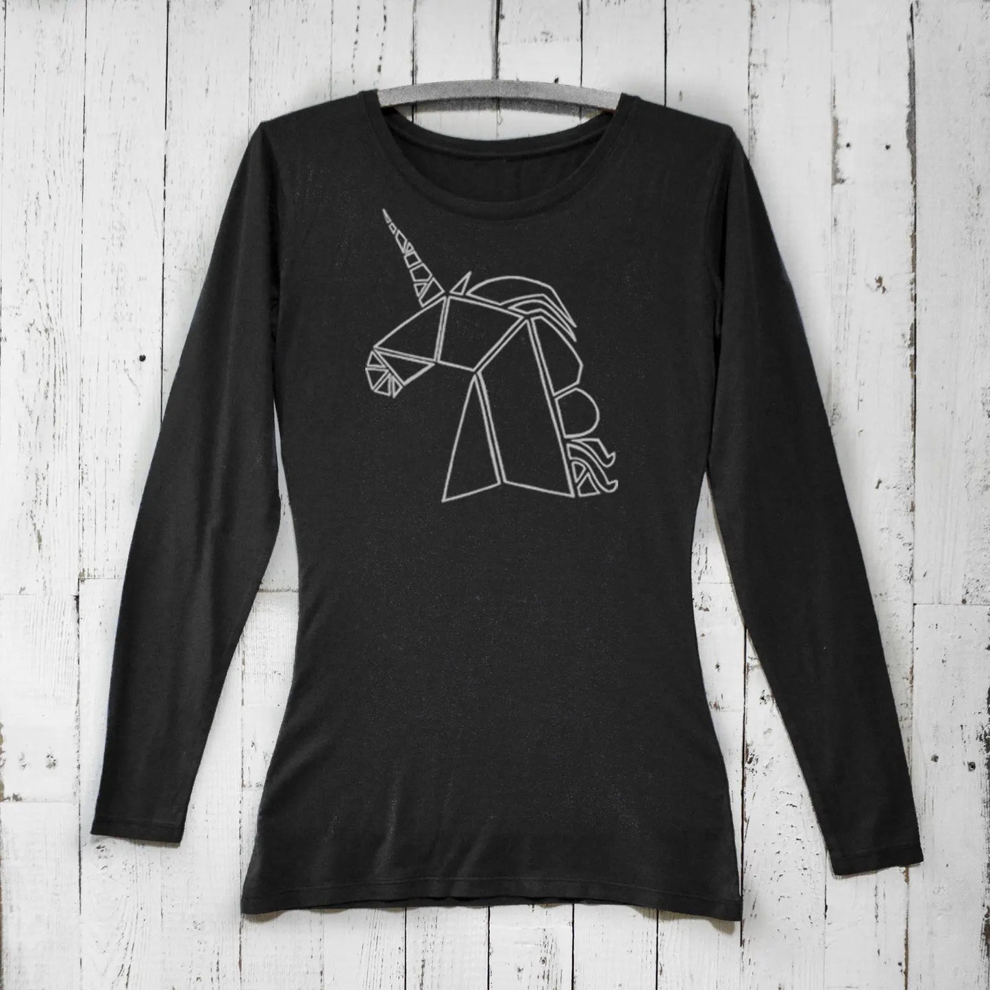 Black unicorn long sleeve t-shirt for women made from bamboo and organic cotton. Features geometric mythical creature design for fantasy lovers.