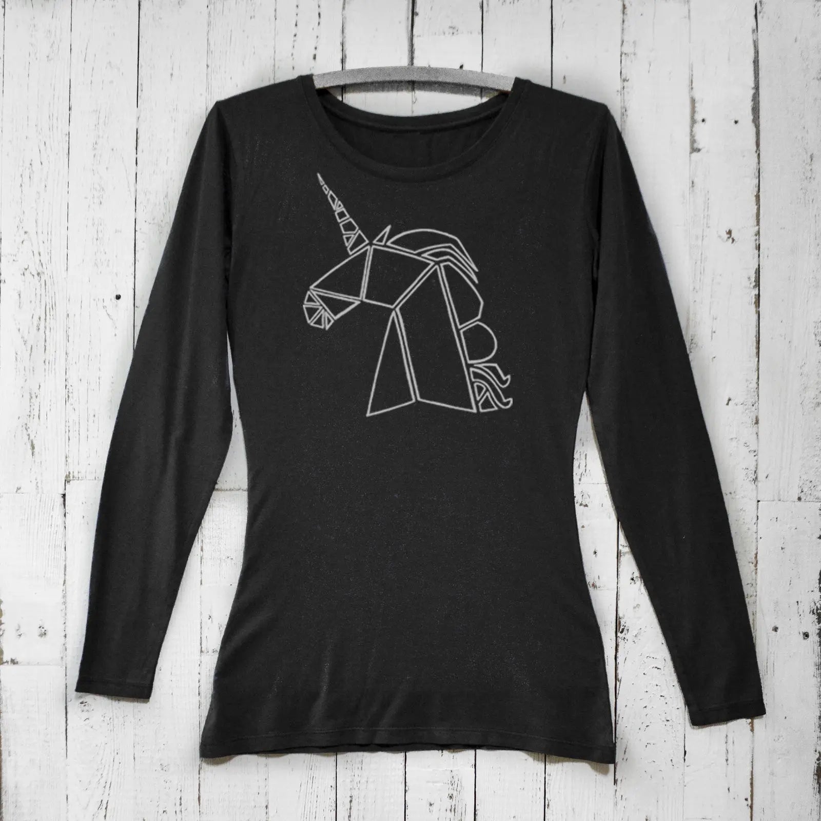 Black unicorn long sleeve t-shirt for women made from bamboo and organic cotton. Features geometric mythical creature design for fantasy lovers.