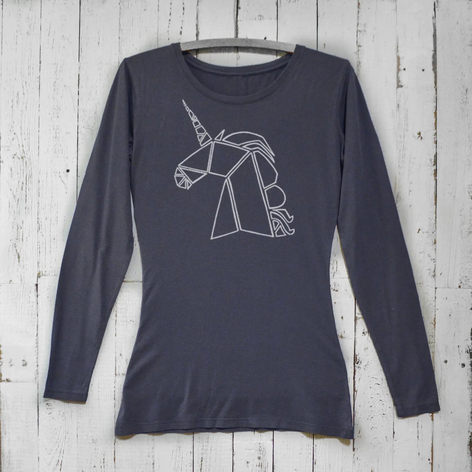 Navy unicorn long sleeve t-shirt for women crafted from bamboo and organic cotton. Magical geometric unicorn print for fantasy fashion fans.