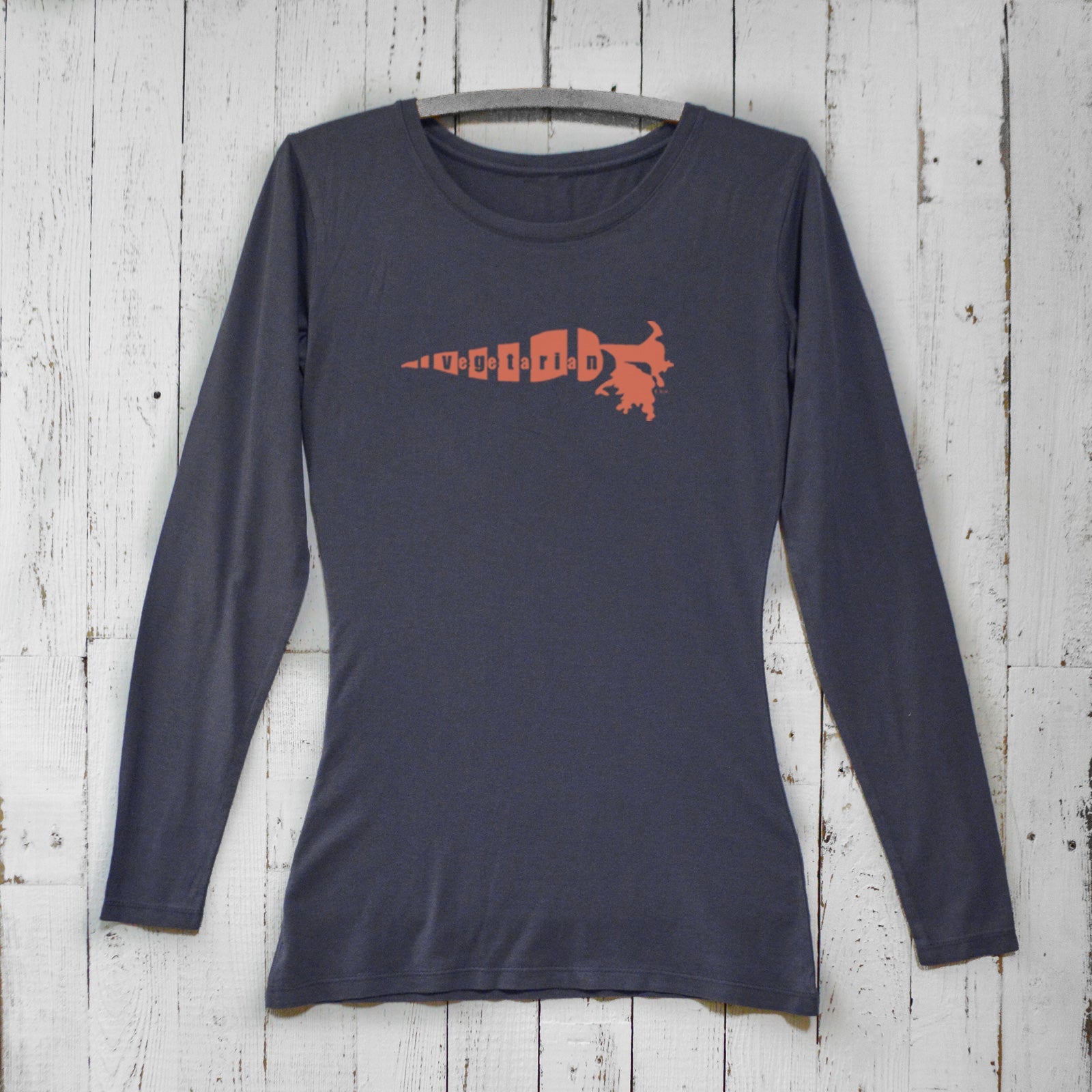 Vegetarian long sleeve t-shirt for women in navy blue with orange carrot graphic. Bamboo organic cotton top for plant-based lifestyle advocates.
