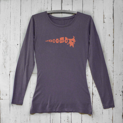 Dark purple vegetarian long sleeve t-shirt for women featuring orange carrot print. Sustainable bamboo organic cotton top for veggie lovers.