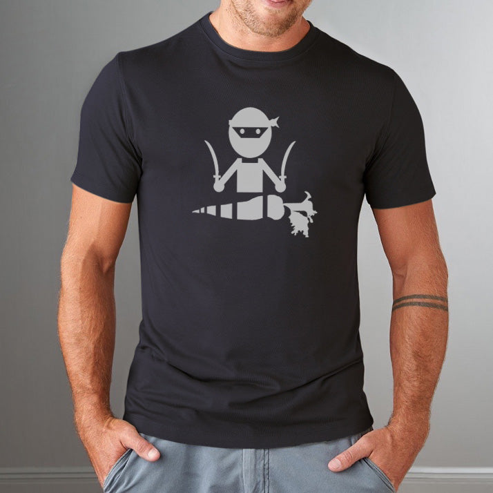 Black bamboo and organic cotton men's vegan T-shirt with 'Veggie Ninja' graphic, modeled for a casual plant-based lifestyle look.