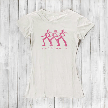 Women's Walking T-Shirt in Bamboo & Organic Cotton in off-white with pink 'Walk More' graphic. Sustainable fitness tee for hikers and walkers.