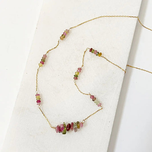 Unique Gemstone Jewelry featuring a Floating Watermelon Tourmaline Necklace with multicolor tourmaline beads on a fine gold-filled chain.