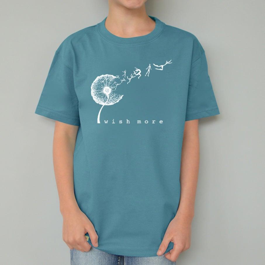 Teal Kids' Organic Cotton T-Shirt modeled by child, with white dandelion 'Wish More' graphic, eco-friendly flower tee by Uni-T.