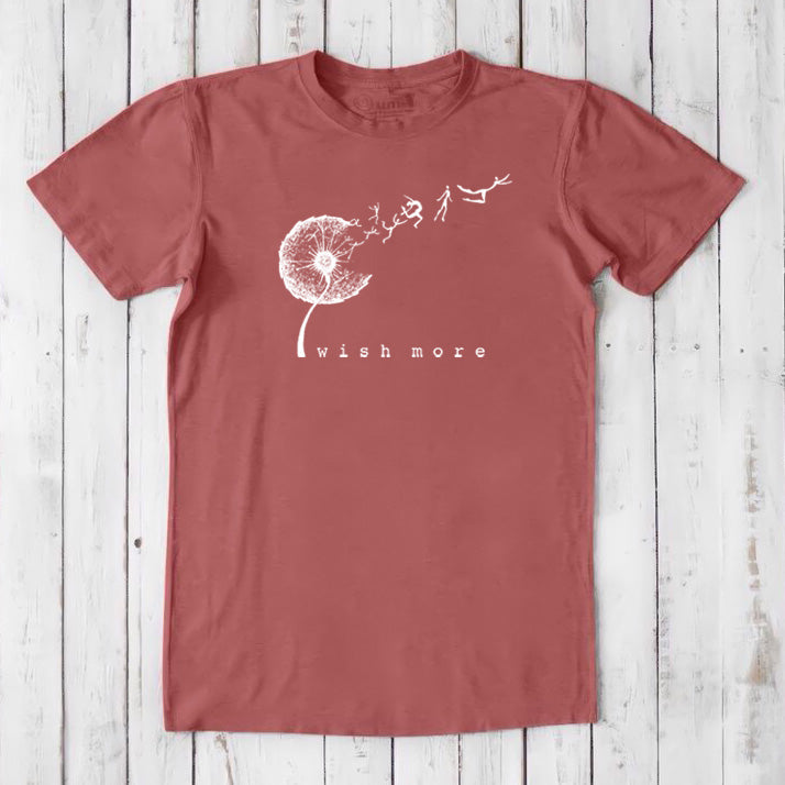 Rust red Men's Dandelion T-Shirt in Bamboo & Organic Cotton with white 'Wish More' design, nature-themed and eco-conscious gift idea.