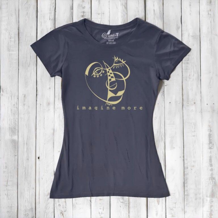Women's Cubism Face T-Shirt in navy bamboo & organic cotton with gold abstract face design and 'imagine more' slogan. Sustainable graphic tee.