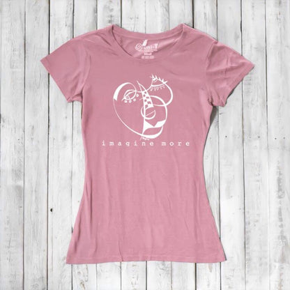 Pink Women's Cubism Face T-Shirt in bamboo & organic cotton with white abstract face and 'imagine more' text. Soft, sustainable gift for artists.
