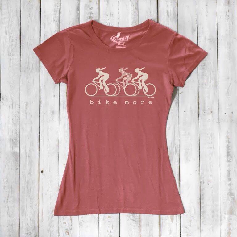 Rust red Women's Bicycle T-Shirt in Bamboo & Organic Cotton with cream 'Bike More' cycling graphic. Sustainable gift for outdoor fitness fans.