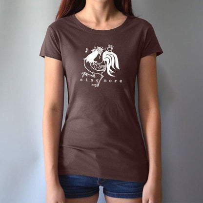 Woman wearing brown 'Sing More' rooster t-shirt made from bamboo and organic cotton, a fun and sustainable gift for music enthusiasts.