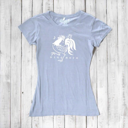 Light blue women's rooster t-shirt with 'Sing More' message, made from eco-friendly bamboo and organic cotton materials.