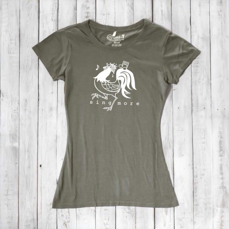 Olive green bamboo and organic cotton t-shirt for women featuring a rooster and 'Sing More' text, ideal for music-themed outfits.