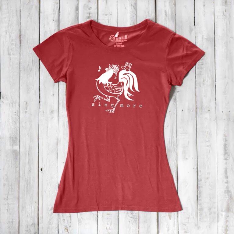 Red women's bamboo and organic cotton t-shirt with white rooster and 'Sing More' slogan, a cheerful gift for music lovers.