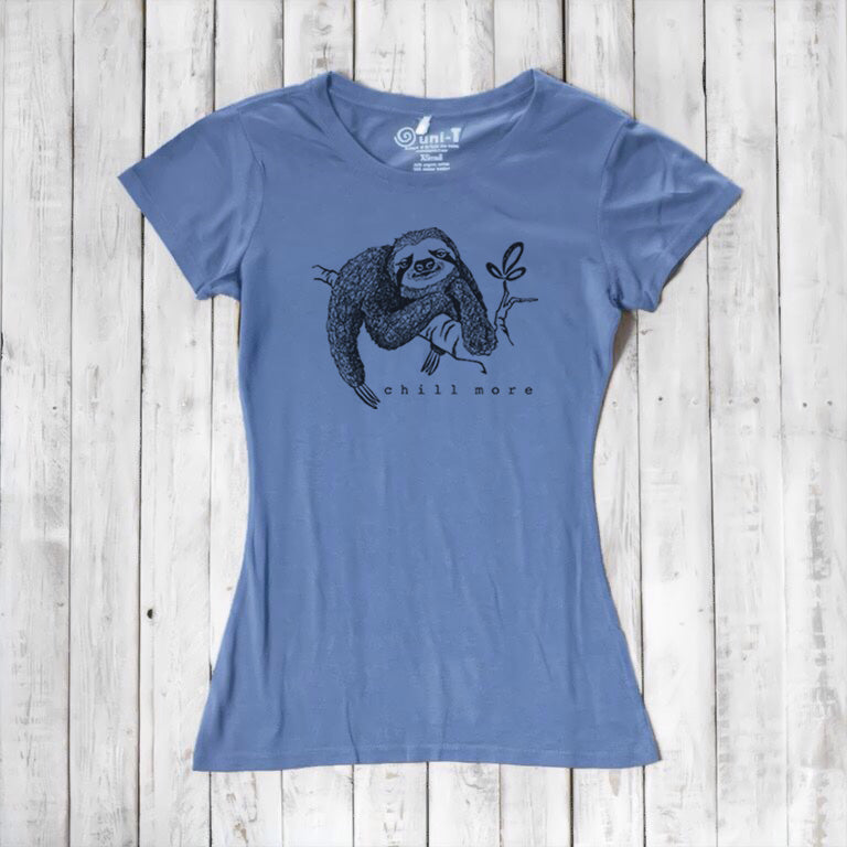 Blue women's sloth T-shirt made from bamboo and organic cotton featuring 'Chill More' graphic. Sustainable and casual nature-themed apparel.