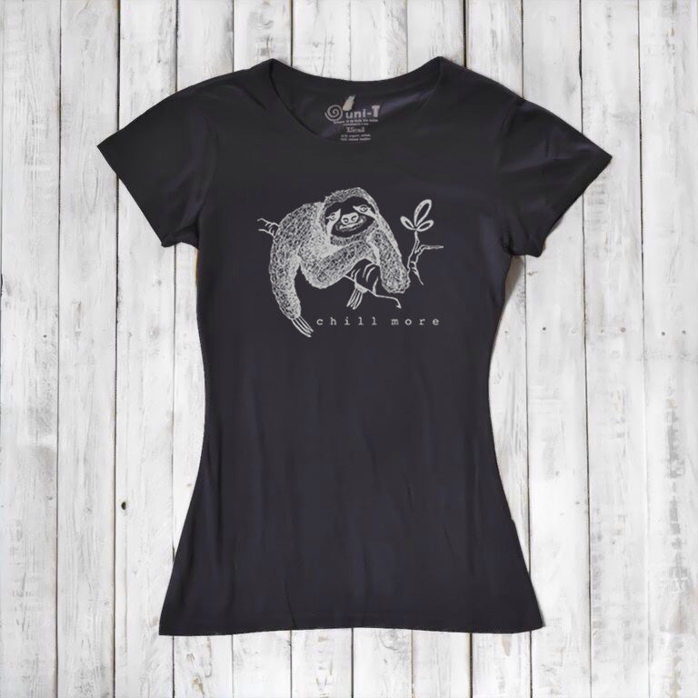 Black women's bamboo and organic cotton T-shirt with white sloth illustration and 'Chill More' slogan. Eco-conscious and stylish gift idea.