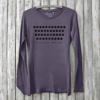 Women's Typewriter Long Sleeve T-Shirt in dark purple bamboo and cotton blend with 'Write More' typewriter key graphic. Ideal gift for writers.
