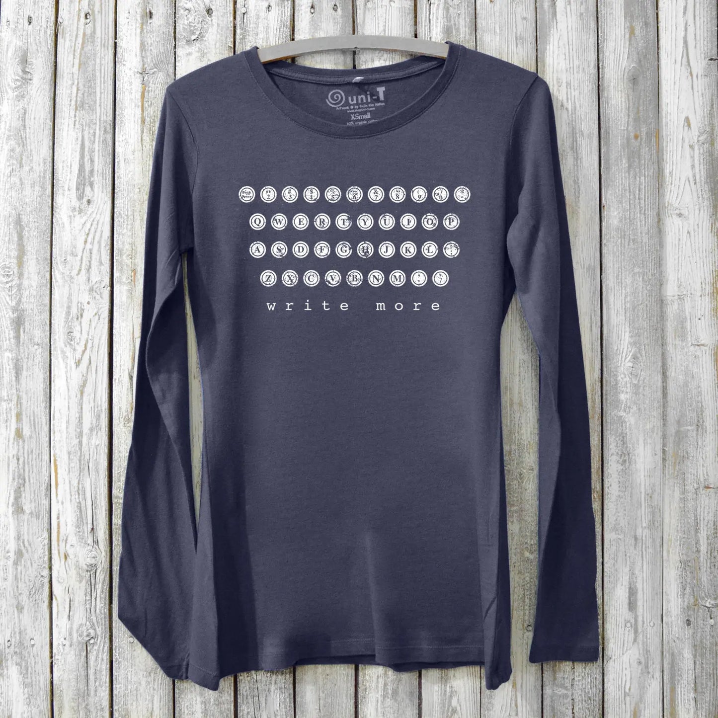Navy Women's Typewriter Long Sleeve T-Shirt made from bamboo and organic cotton, featuring 'Write More' literary graphic. Cozy tee for authors.