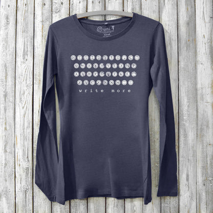 Navy Women's Typewriter Long Sleeve T-Shirt made from bamboo and organic cotton, featuring 'Write More' literary graphic. Cozy tee for authors.