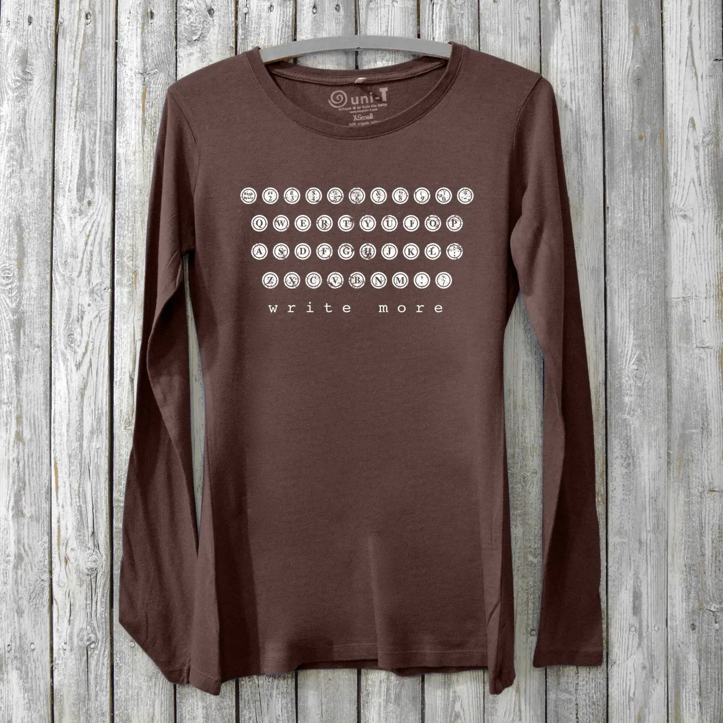 Dark brown bamboo and cotton Women's Typewriter Long Sleeve T-Shirt with vintage key design and 'Write More' message. Eco-friendly writer's apparel.