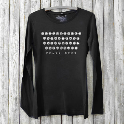 Black Women's Typewriter Long Sleeve T-Shirt in bamboo and organic cotton with white 'Write More' typewriter key print. Inspirational gift for creatives.