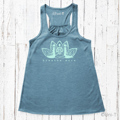 Blue Yoga Flowy Tank Top for Women with 'Breathe More' lotus design. Eco-friendly and soft fabric ideal for yoga and meditation wear.