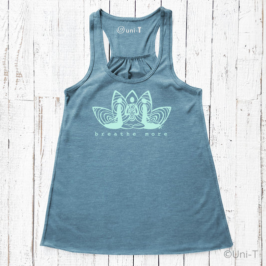 Blue Yoga Flowy Tank Top for Women with 'Breathe More' lotus design. Eco-friendly and soft fabric ideal for yoga and meditation wear.