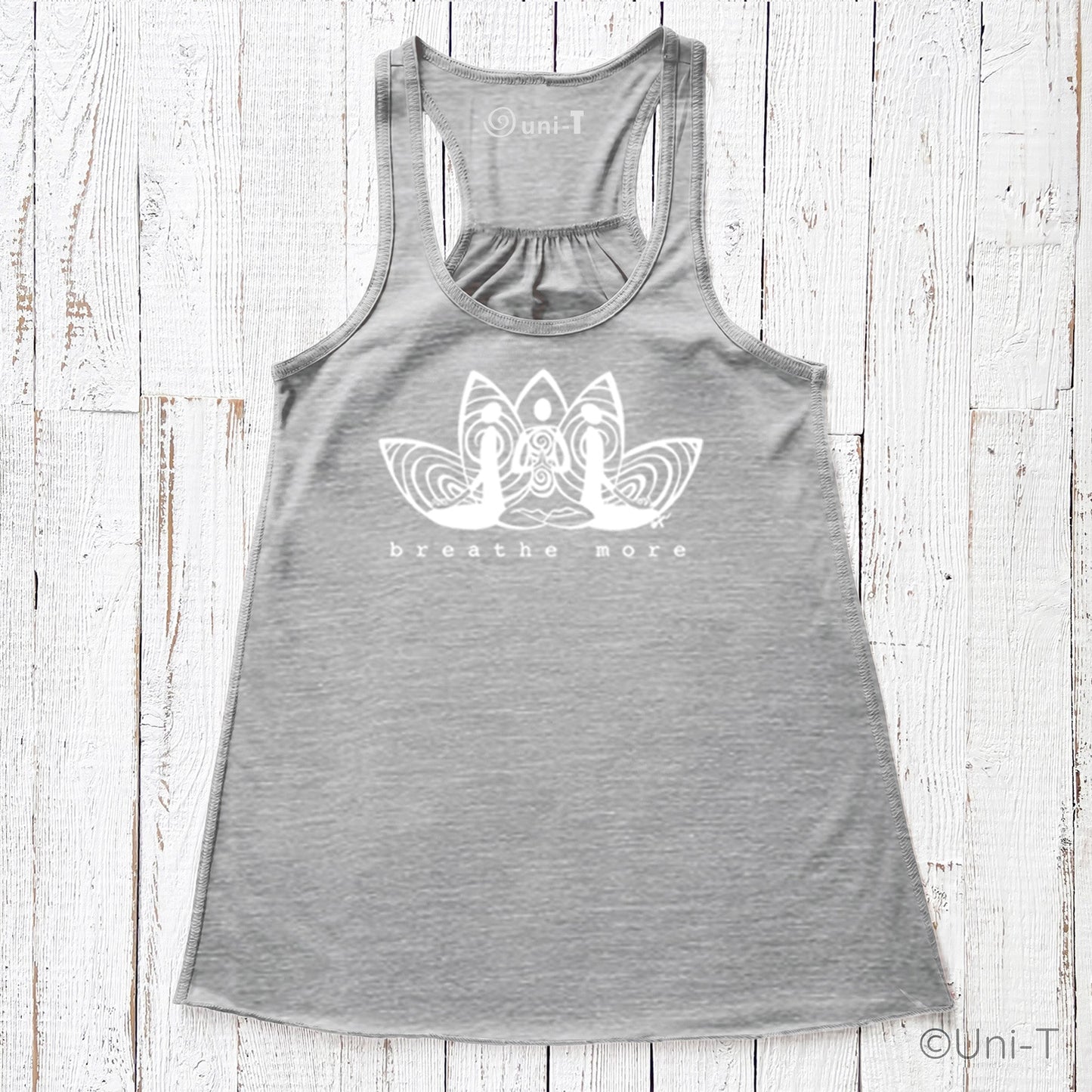 Grey Yoga Flowy Tank Top for Women featuring 'Breathe More' lotus artwork. Comfortable and sustainable yoga apparel.